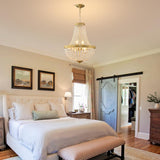 French Empire K9 crystal chandelier in brushed brass